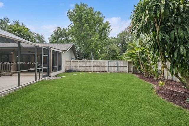 7935 SW 155th St, Palmetto Bay, FL 33157 - view of yard featuring a patio and glass enclosure