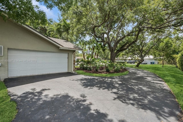 7935 SW 155th St, Palmetto Bay, FL 33157 - garage with asphalt driveway