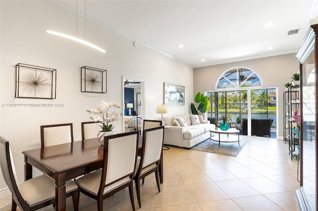 921 SW 176th Ave, Pembroke Pines, FL 33029 - dining area with light tile patterned floors, ornamental molding, and recessed lighting