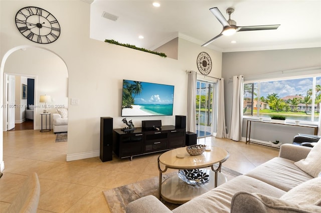 921 SW 176th Ave, Pembroke Pines, FL 33029 - living area featuring light tile patterned floors, ornamental molding, high vaulted ceiling, a ceiling fan, and arched walkways