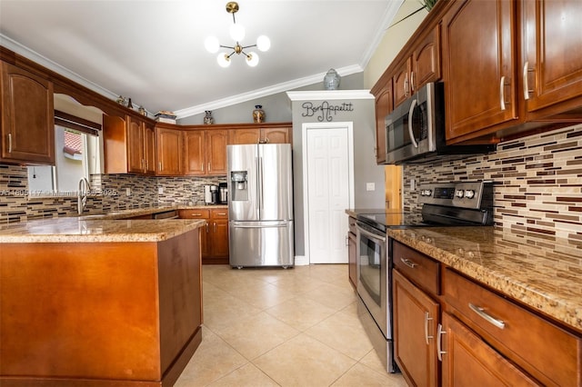 921 SW 176th Ave, Pembroke Pines, FL 33029 - kitchen featuring appliances with stainless steel finishes, crown molding, lofted ceiling, light stone countertops, and tasteful backsplash