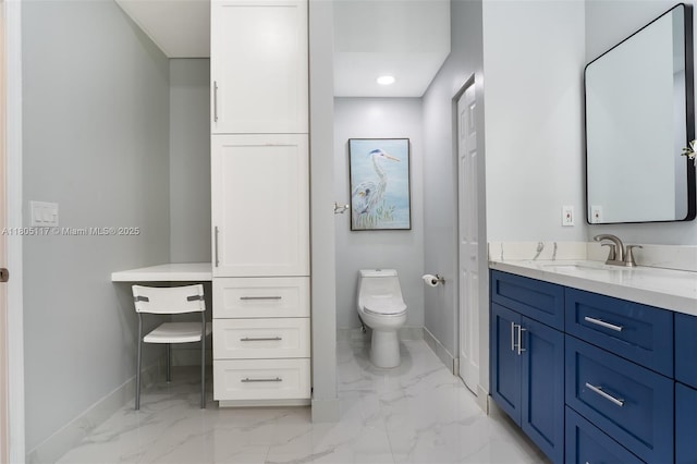 921 SW 176th Ave, Pembroke Pines, FL 33029 - bathroom with baseboards, vanity, marble look tile flooring, and toilet