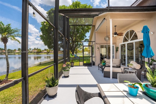 921 SW 176th Ave, Pembroke Pines, FL 33029 - sunroom featuring a water view, ceiling fan, and an outdoor living space