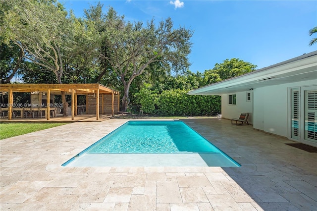 outdoor pool with a patio