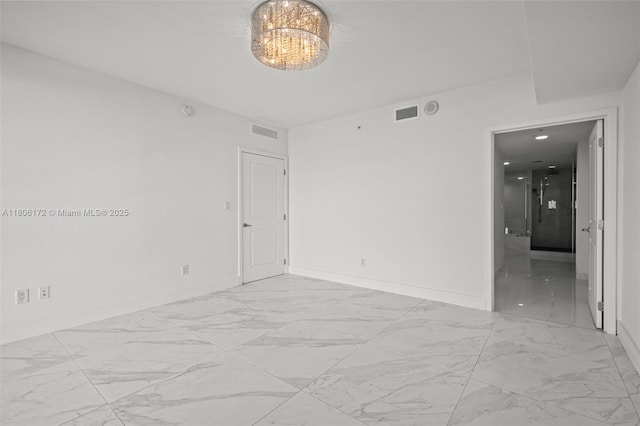 400 Sunny Isles Blvd Unit 1005, Sunny Isles Beach, FL 33160 - spare room with light marble finish floors and baseboards