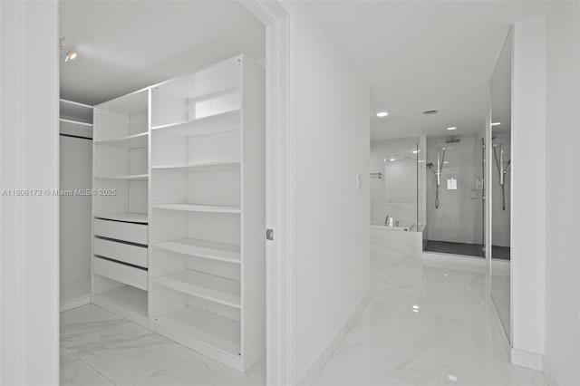 400 Sunny Isles Blvd Unit 1005, Sunny Isles Beach, FL 33160 - spacious closet featuring marble finish flooring