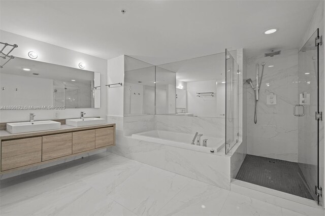 400 Sunny Isles Blvd Unit 1005, Sunny Isles Beach, FL 33160 - bathroom featuring a marble finish shower, marble finish floors, a bath, double vanity, and recessed lighting