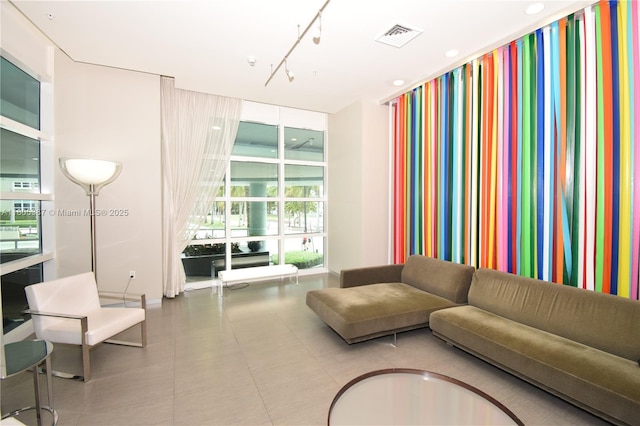 1900 N Bayshore Dr Unit 2804, Miami, FL 33132 - living area featuring a wall of windows and rail lighting