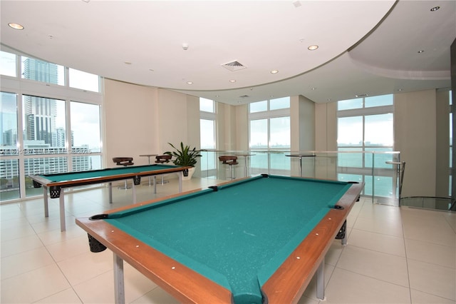 1900 N Bayshore Dr Unit 2804, Miami, FL 33132 - recreation room featuring healthy amount of natural light, pool table, expansive windows, light tile patterned floors, and recessed lighting