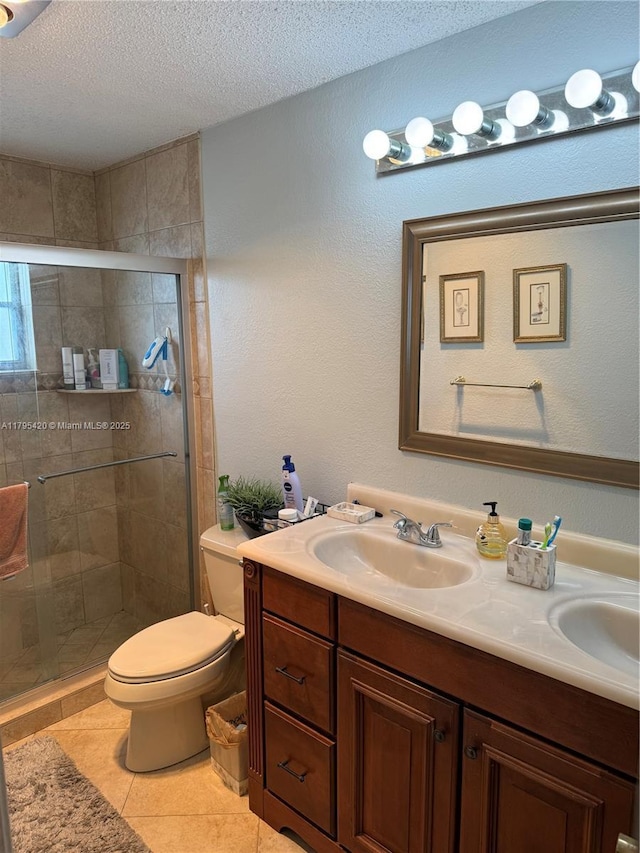 1250 NW 85th Ave, Plantation, FL 33322 - bathroom featuring a textured ceiling, a shower stall, double vanity, toilet, and tile patterned flooring