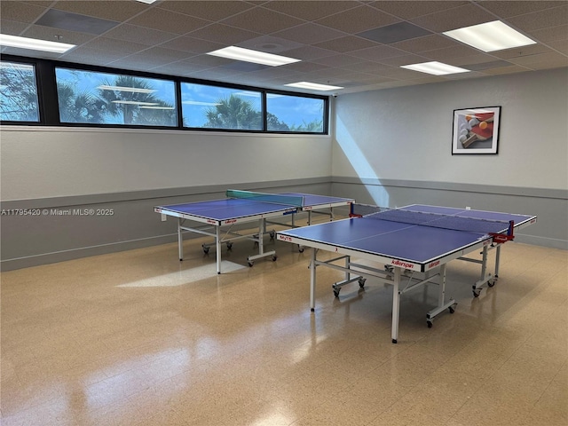 1250 NW 85th Ave, Plantation, FL 33322 - game room featuring tile patterned floors, baseboards, and a paneled ceiling