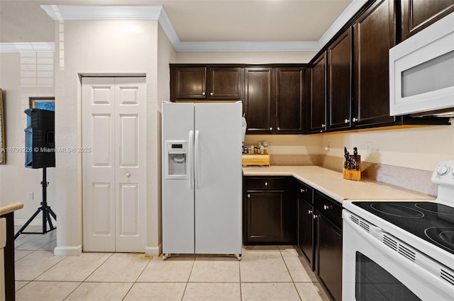 22780 SW 92nd Ct, Cutler Bay, FL 33190 - kitchen with white appliances, ornamental molding, light tile patterned floors, light countertops, and dark brown cabinetry