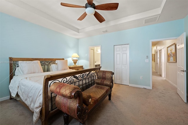 22780 SW 92nd Ct, Cutler Bay, FL 33190 - bedroom featuring a raised ceiling, light carpet, baseboards, and ceiling fan