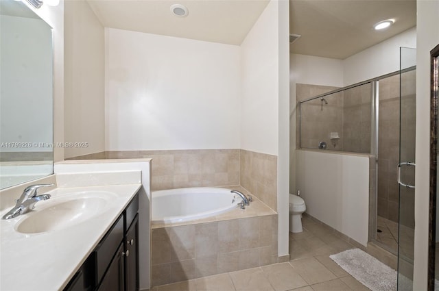 22780 SW 92nd Ct, Cutler Bay, FL 33190 - bathroom featuring tile patterned flooring, a stall shower, vanity, toilet, and recessed lighting