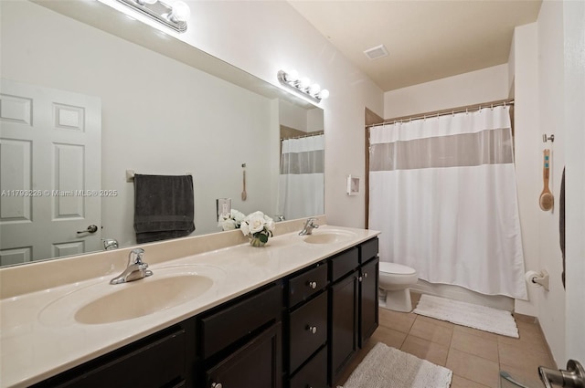 22780 SW 92nd Ct, Cutler Bay, FL 33190 - full bath with tile patterned floors, toilet, double vanity, and shower / tub combo with curtain