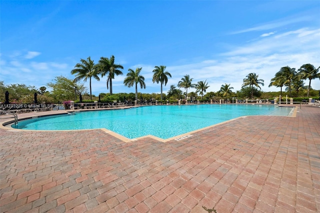 22780 SW 92nd Ct, Cutler Bay, FL 33190 - community pool with a patio
