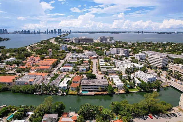 view of urban area with a large body of water
