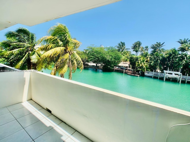 view of swimming pool with a water view