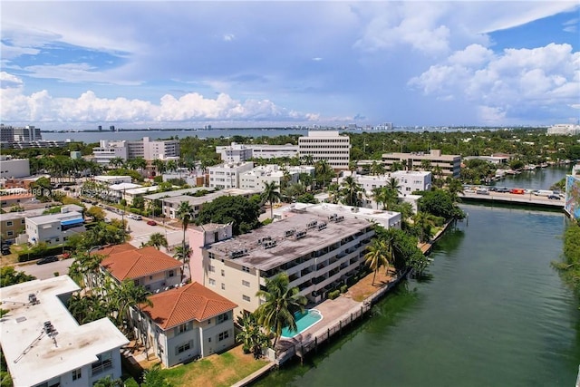 view of urban area with a nearby body of water