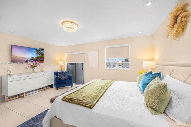 11429 NW 93rd Ct Unit 1, Hialeah Gardens, FL 33018 - bedroom with light tile patterned flooring