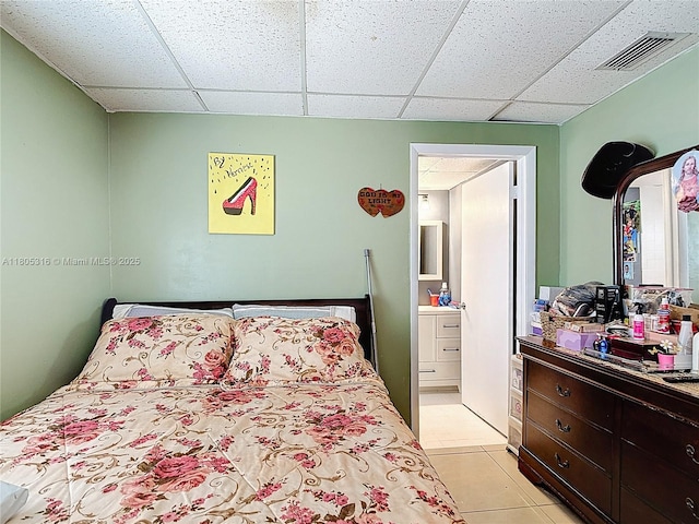 280 NW 45th St, Miami, FL 33127 - bedroom with a drop ceiling and light tile patterned floors