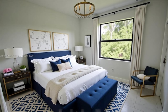 7006 Chain Ct, La Belle, FL 33935 - bedroom featuring a chandelier and baseboards