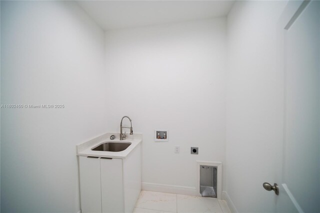 7006 Chain Ct, La Belle, FL 33935 - laundry room featuring hookup for an electric dryer, a sink, hookup for a washing machine, light marble finish floors, and baseboards