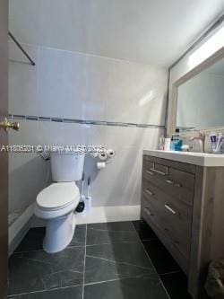 801 Three Islands Blvd Unit 112, Hallandale Beach, FL 33009 - bathroom with vanity and toilet
