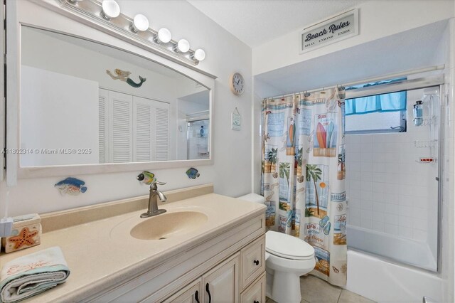 330 Lasayette Dr NE, Port Charlotte, FL 33952 - full bath with vanity, toilet, shower / bath combo with shower curtain, and tile patterned flooring