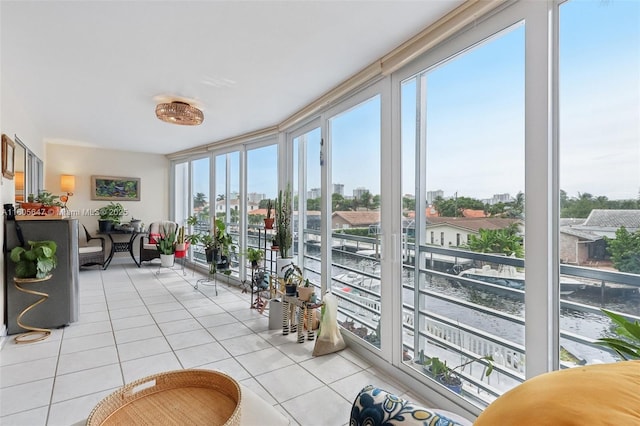 3050 NE 47th Ct Unit 205, Fort Lauderdale, FL 33308 - sunroom / solarium with tile patterned flooring and expansive windows