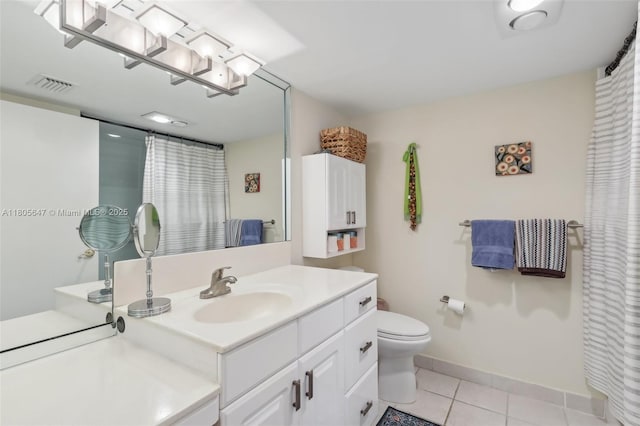 3050 NE 47th Ct Unit 205, Fort Lauderdale, FL 33308 - bathroom with tile patterned floors, toilet, vanity, and baseboards