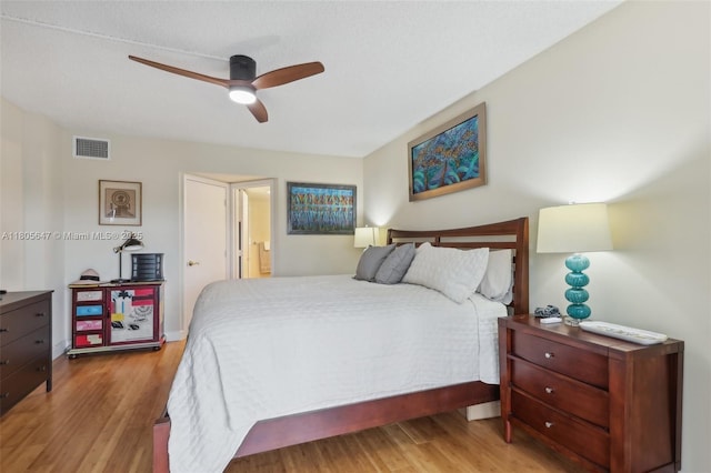 3050 NE 47th Ct Unit 205, Fort Lauderdale, FL 33308 - bedroom featuring wood finished floors and a ceiling fan