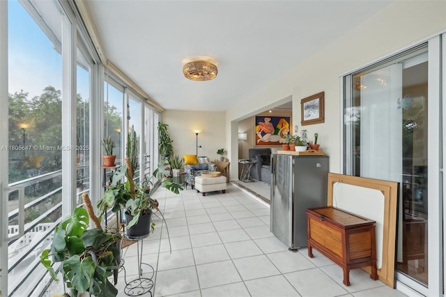 3050 NE 47th Ct Unit 205, Fort Lauderdale, FL 33308 - sunroom with tile patterned flooring