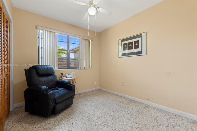 4295 SW 97th Ct, Miami, FL 33165 - living area with speckled floor and baseboards