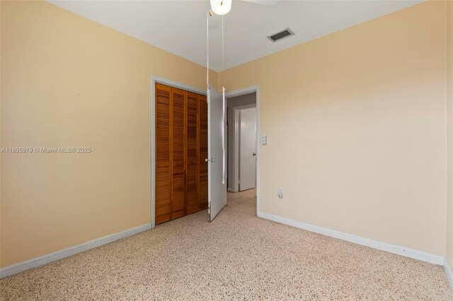 4295 SW 97th Ct, Miami, FL 33165 - empty room featuring baseboards and speckle patterned floor