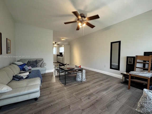 75 Washington Ave Unit 18, Miami Beach, FL 33139 - living area featuring ceiling fan, baseboards, and dark wood-type flooring