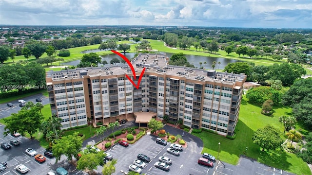 900 Saint Charles Pl Unit 616, Pembroke Pines, FL 33026 - aerial view of apartment complex / building, a nearby body of water, and a tree filled landscape
