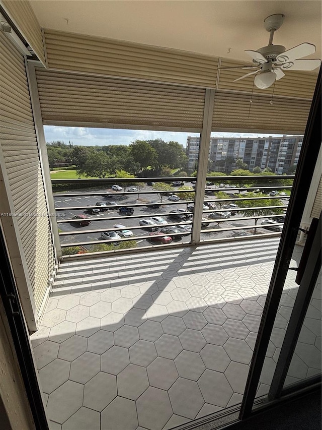 900 Saint Charles Pl Unit 616, Pembroke Pines, FL 33026 - unfurnished sunroom featuring ceiling fan and a view of city