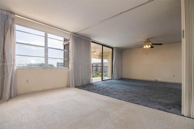 900 Saint Charles Pl Unit 616, Pembroke Pines, FL 33026 - unfurnished room featuring carpet floors, ceiling fan, and a textured ceiling