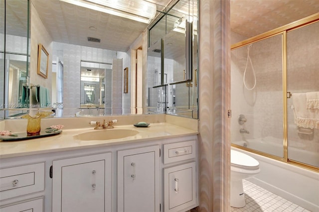 900 Saint Charles Pl Unit 616, Pembroke Pines, FL 33026 - bathroom featuring toilet, tile patterned floors, vanity, and bath / shower combo with glass door