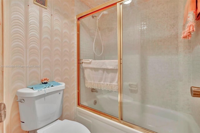 900 Saint Charles Pl Unit 616, Pembroke Pines, FL 33026 - bathroom featuring enclosed tub / shower combo and toilet