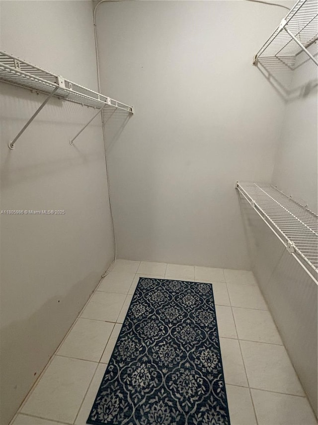 900 Saint Charles Pl Unit 616, Pembroke Pines, FL 33026 - spacious closet with tile patterned floors