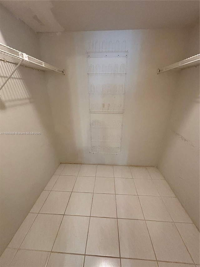 900 Saint Charles Pl Unit 616, Pembroke Pines, FL 33026 - spacious closet with tile patterned flooring