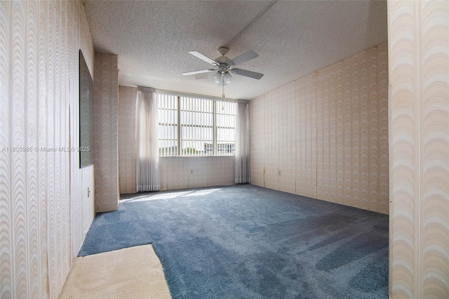 900 Saint Charles Pl Unit 616, Pembroke Pines, FL 33026 - unfurnished room featuring carpet flooring, a ceiling fan, wallpapered walls, and a textured ceiling