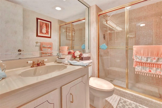 900 Saint Charles Pl Unit 616, Pembroke Pines, FL 33026 - bathroom featuring toilet, tile patterned flooring, vanity, and a stall shower