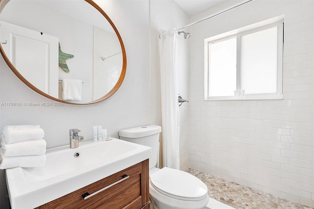 1411 NE 12th St, Fort Lauderdale, FL 33304 - full bath featuring tiled shower, toilet, and vanity