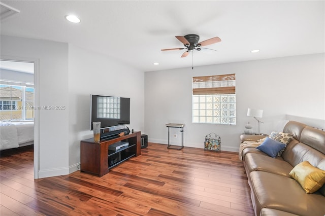 1282 Grant Ct, Hollywood, FL 33019 - living area featuring plenty of natural light, wood finished floors, a ceiling fan, and recessed lighting