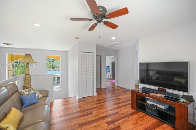 1282 Grant Ct, Hollywood, FL 33019 - living area featuring wood finished floors, a ceiling fan, recessed lighting, and baseboards