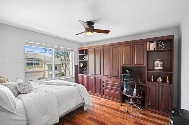 1282 Grant Ct, Hollywood, FL 33019 - bedroom featuring an office area, light wood-style flooring, and ceiling fan