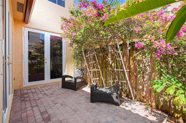 1282 Grant Ct, Hollywood, FL 33019 - view of patio with french doors